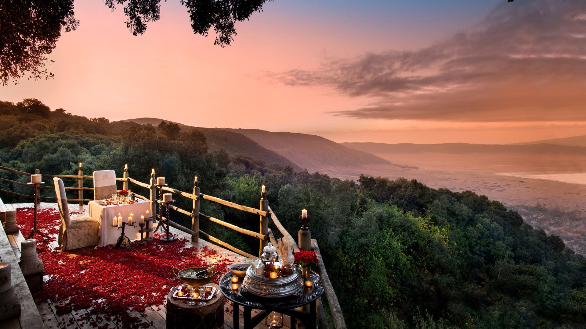 Header romantic dinner with rose petals overlooking the ngorongoro crater on a luxury tanzania safari 1