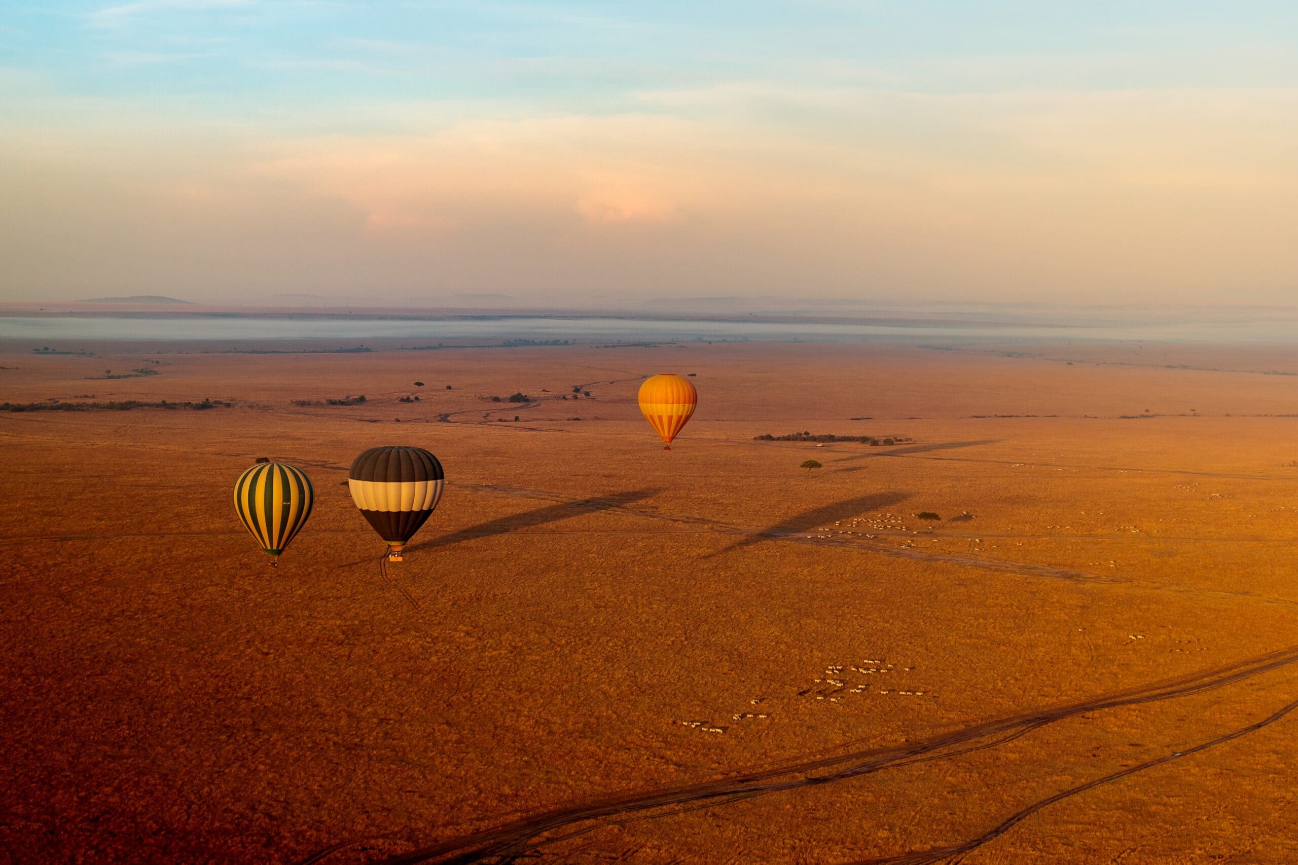 high angle shot of three air balloons at sunrise i 2022 12 31 05 02 50 utc scaled